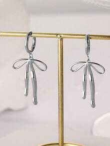 1 par de pendientes largos de lazo elegante en plata, accesorios versátiles para mujeres