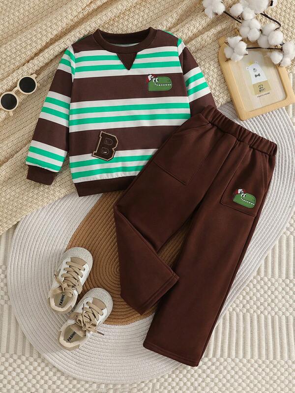 Set di felpa per bambini da 4 a 7 anni, composto da maglia a maniche lunghe con stampa a righe e dinosauri + pantaloni casual con tasche e stampa di dinosauri, adatto per primavera/autunno, per tempo libero, attività all'aperto, sport e uso quotidiano