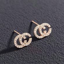 1 قطعة أقراط إبزيم بشكل C بتصميم أنيق، وصول جديد 2025