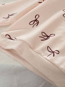 秋季衣服套装年轻女孩长袖蝴蝶结印花毛衣上衣和休闲裤两件套春季服装 - 米色 - 查看 5