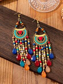 1 par de pendientes vintage con borlas en forma de lágrima exagerada