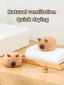 可爱水豚沐浴海绵 - 柔软低敏，浅米色，温和去角质清洁。完美的浴室装饰，经久耐用，是理想的沐浴用品。萌趣的水豚造型和柔软的浅米色材质，带来轻松愉悦的沐浴体验，非常适合面部和身体去角质。另有可爱沐浴海绵、大号沐浴海绵及其他沐浴用品可供选择。 - 彩色 - 查看 5