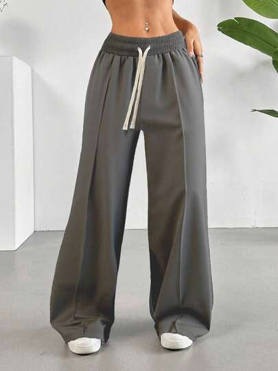 女士休闲直筒抽绳腰弹力裤，适合秋冬季运动休闲穿着