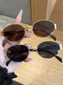 一副金属圆形时尚眼镜，适合日常佩戴、海滩、户外旅行，是女士的必备单品，也是秋冬季女士服装、商务休闲装、夏季海滩度假、户外旅行的理想礼物。复古椭圆形镜框，适合外出穿着，也适合返校季。