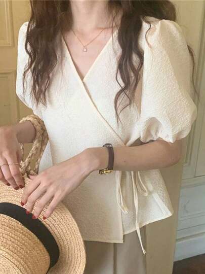 Blusa con mangas abullonadas, cuello en V y lazo delantero, de corte holgado y relajado Camisetas de Mujer Blusas de Mujer