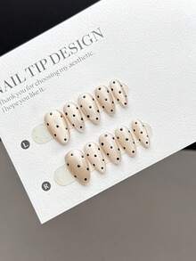 10片装手工可佩戴美甲贴片，短款杏仁形按压式假指甲，时尚简约风格，纯手工绘制浅卡其色玻璃珠猫眼短指甲，饰以流行的黑色波点图案，是高端美甲贴片，适合女性和女孩日常佩戴，包含美甲套装和手工按压式假指甲。 - 彩色 - 查看 4