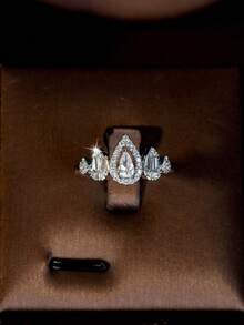 1 Set de joyería con diseño de gota de agua hueca con circonita cúbica, adecuado como regalo del Día de San Valentín para mujeres