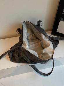 Túi đeo vai nữ thời trang mới, được làm từ chất liệu PU, có hai quai xách và thiết kế trang trí đinh tán, kiểu dáng sành điệu và hiện đại, phù hợp cho mua sắm, đi chơi, du lịch và nhiều dịp khác nhau. - màu đen - Xem 7