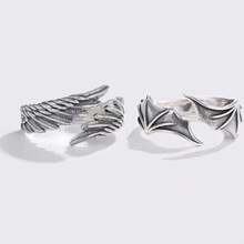 Thai Silver Pair Rings: Angel's Wings Encounter Demon's Wings With The Tenderness Of Angel Wings On One Half And The Sleek Aura Of Demon Wings On The Other, They Inscribe Your One-Of-A-Kind Tie And Unlock A Novel Way To Convey Love.