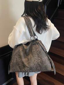 Túi đeo vai nữ thời trang mới, được làm từ chất liệu PU, có hai quai xách và thiết kế trang trí đinh tán, kiểu dáng sành điệu và hiện đại, phù hợp cho mua sắm, đi chơi, du lịch và nhiều dịp khác nhau. - màu đen - Xem 4