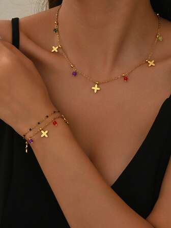 1 套波西米亚风格不锈钢首饰套装，采用四叶花/不对称串珠设计，适合女性日常或度假佩戴