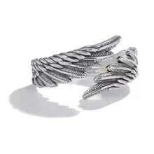 Thai Silver Pair Rings: Angel's Wings Encounter Demon's Wings With The Tenderness Of Angel Wings On One Half And The Sleek Aura Of Demon Wings On The Other, They Inscribe Your One-Of-A-Kind Tie And Unlock A Novel Way To Convey Love.