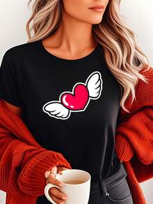 Camiseta gráfica casual para mujer con estampado de corazón de ángel, cómoda camiseta de manga corta de mezcla de algodón, adecuada para el estilo diario, diseño moderno y moderno, el regalo perfecto para ella, de gran tamaño. - Negro - Ver 1