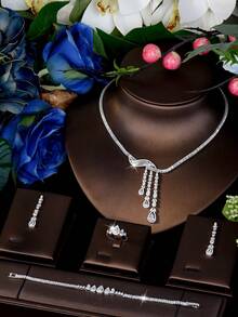 1 Set de joyería con diseño de gota de agua hueca con circonita cúbica, adecuado como regalo del Día de San Valentín para mujeres