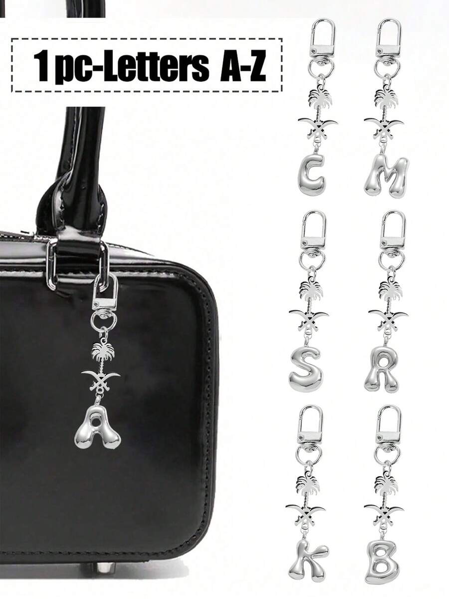 Ciondolo a forma di lettera in caratteri a bolle, ciondolo portafortuna in cristallo, portachiavi in acciaio inossidabile con pendente a forma di palma e teschio incrociato, lettere dell'alfabeto da A a Z, ciondolo per borse e zaini in lega lucida - regalo perfetto per compleanni e occasioni speciali, portachiavi, ciondolo per borse, zaini e auto, accessori per portafogli e borse da donna e ragazze.