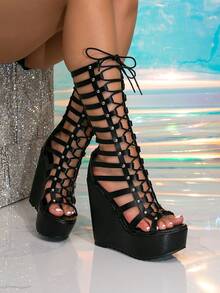 Women's Wedge-Heeled Platform Roman Sandals With Rounded Open Toe And Cross-Strap Rivets In Black PU Fabric. Perfect For Parties, Festivals, And Outdoor Activities. Versatile, Height-Enhancing, And Waterproof Women's Shoes. - màu đen - Xem 1