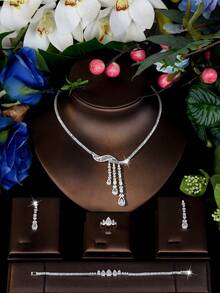 1 Set de joyería con diseño de gota de agua hueca con circonita cúbica, adecuado como regalo del Día de San Valentín para mujeres