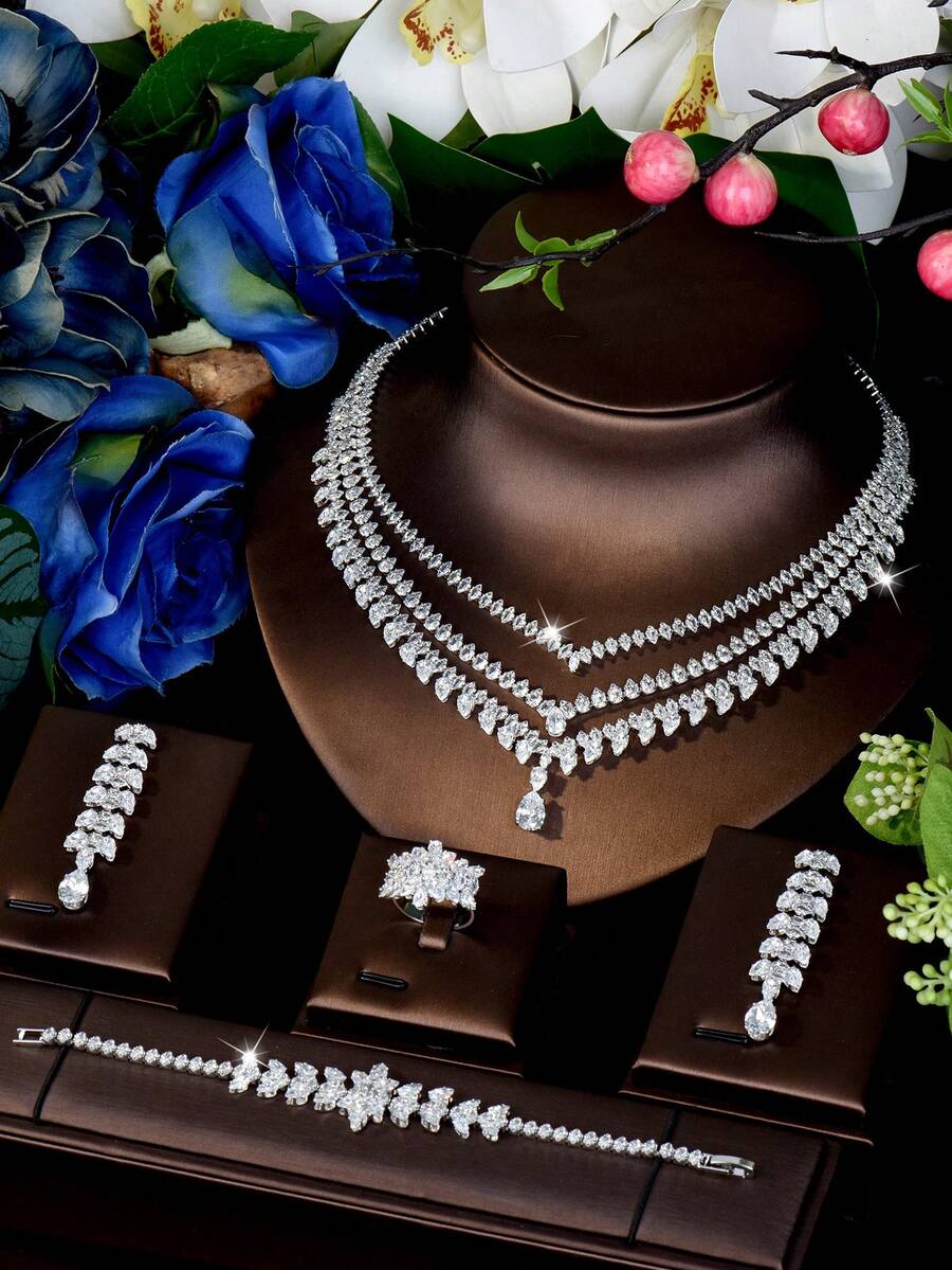 1 套浪漫方晶锆石流苏首饰套装，适合作为情人节礼物送给女士