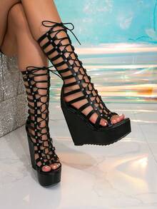 Women's Wedge-Heeled Platform Roman Sandals With Rounded Open Toe And Cross-Strap Rivets In Black PU Fabric. Perfect For Parties, Festivals, And Outdoor Activities. Versatile, Height-Enhancing, And Waterproof Women's Shoes. - màu đen - Xem 5