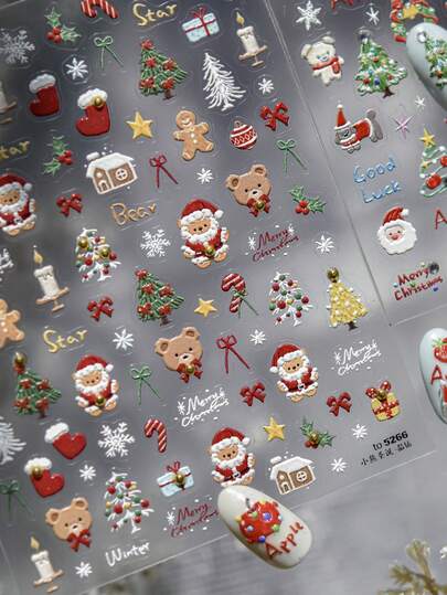 1张可爱小熊圣诞主题5D美甲贴纸，包含圣诞老人、雪人、节日蜡烛、优雅蝴蝶结、闪亮星星和礼盒设计，适合节日冬季美甲装饰。