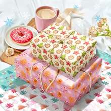 6pcs Pink Christmas Wrapping Paper Exudes A Warm Festive Atmosphere. These Exquisite Wrappers Are Specially Designed For Christmas. With A Soft Pink As The Main Color, They Are Decorated With Cute Patterns Such As Candy Canes, Gingerbread Christmas Trees, Etc.