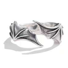 Thai Silver Pair Rings: Angel's Wings Encounter Demon's Wings With The Tenderness Of Angel Wings On One Half And The Sleek Aura Of Demon Wings On The Other, They Inscribe Your One-Of-A-Kind Tie And Unlock A Novel Way To Convey Love.