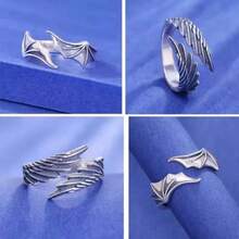 Thai Silver Pair Rings: Angel's Wings Encounter Demon's Wings With The Tenderness Of Angel Wings On One Half And The Sleek Aura Of Demon Wings On The Other, They Inscribe Your One-Of-A-Kind Tie And Unlock A Novel Way To Convey Love.