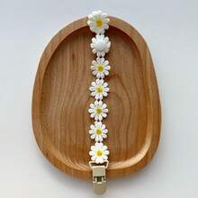 1个雏菊刺绣布艺奶嘴夹，防丢夹