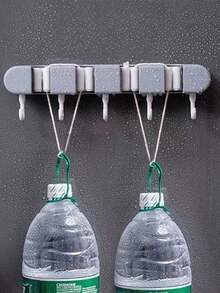 حامل مكنسة جداري، رف تخزين المكنسة/المسح بدون براغي، خطاف تخزين فوق الباب بدون ثقب للحمام والنوم، مشبك المسح، مشبك منظم أدوات متعدد الوظائف، مناسب للمطبخ والحديقة ومستلزمات التنظيف والأدوات المنزلية، منزل حديث - متعدد الألوان - مشاهدة 7