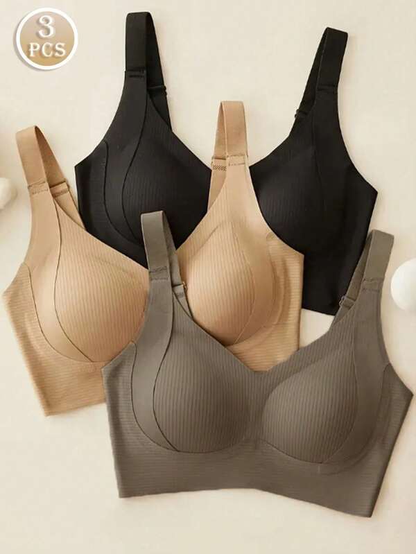 Set de 3 sujetadores deportivos sin costuras, transpirables y inalámbricos para mujeres - Cobertura total, antideslizante, con elevación y soporte, ajuste cómodo con detalles acanalados, mezcla de nailon y elastano, lavar a mano - unicolor elegantes