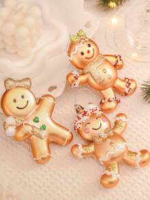Set luxos de 3 ornamente aurii cu omuleț de turtă dulce - Prezintă un design 3D complex cu detalii în relief și un finisaj lucios de înaltă calitate. Decorațiuni elegante perfecte pentru bradul de Crăciun pentru casă, petrecere sau ca idee de cadou festiv. (8,6 x 9,4 cm) - Aur - Vizualizare 3