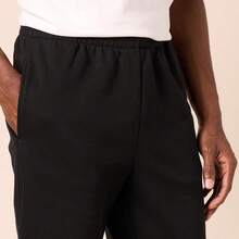 Pantalones deportivos de forro polar para hombre - Negro - Ver 11