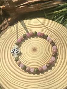 6毫米莲花脉轮手链，镶嵌玫瑰石英、蔷薇辉石和红绿石——天然宝石珠象征着繁荣与爱情。这款优雅的饰品非常适合日常佩戴，是一件波西米亚风格的灵性珠宝，也是送给爱人的华丽水晶礼物。 - 彩色 - 查看 3