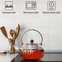 1pc High Heat Resistant Glass Teapot With Filter, Wooden Handle, Thick Glass, Home Use Tea Pot