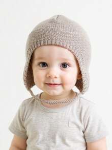 1 pezzo Cappellino con paraorecchie per neonati, berretto lavorato a maglia di colore unito adatto per neonati maschi e femmine, per autunno/inverno/primavera, per proteggere testa e orecchie dal freddo