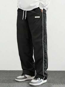 Pantalones rectos casuales para hombres con franja lateral, pantalones deportivos de corte holgado para la calle, ligeros para primavera y otoño - Negro - Ver 1