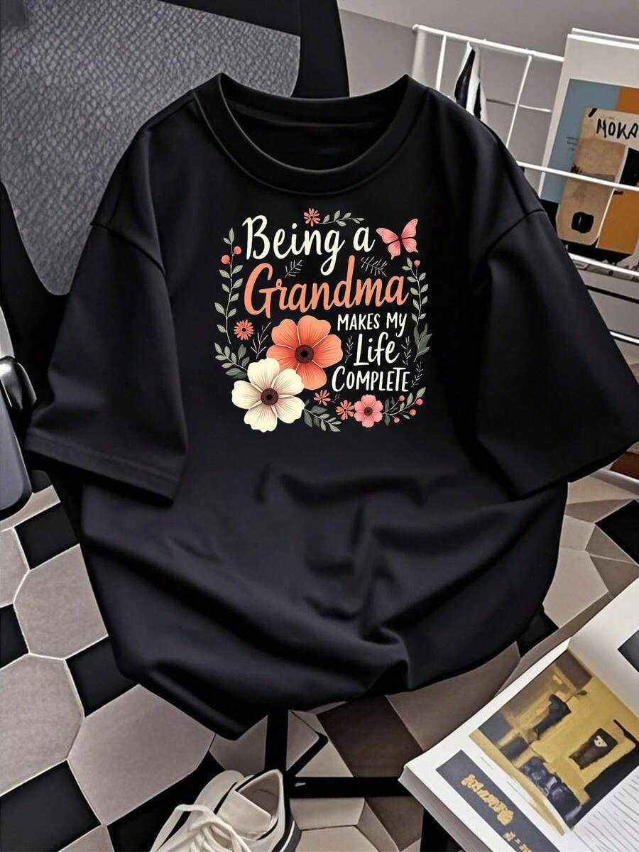 Exquisita camiseta con estampado de letras florales y mariposas para mujer, cómoda camiseta casual de manga corta con cuello redondo, adecuada para primavera y verano, artículos de moda y personalizados.Tamaño extra grande - Negro - Ver 1