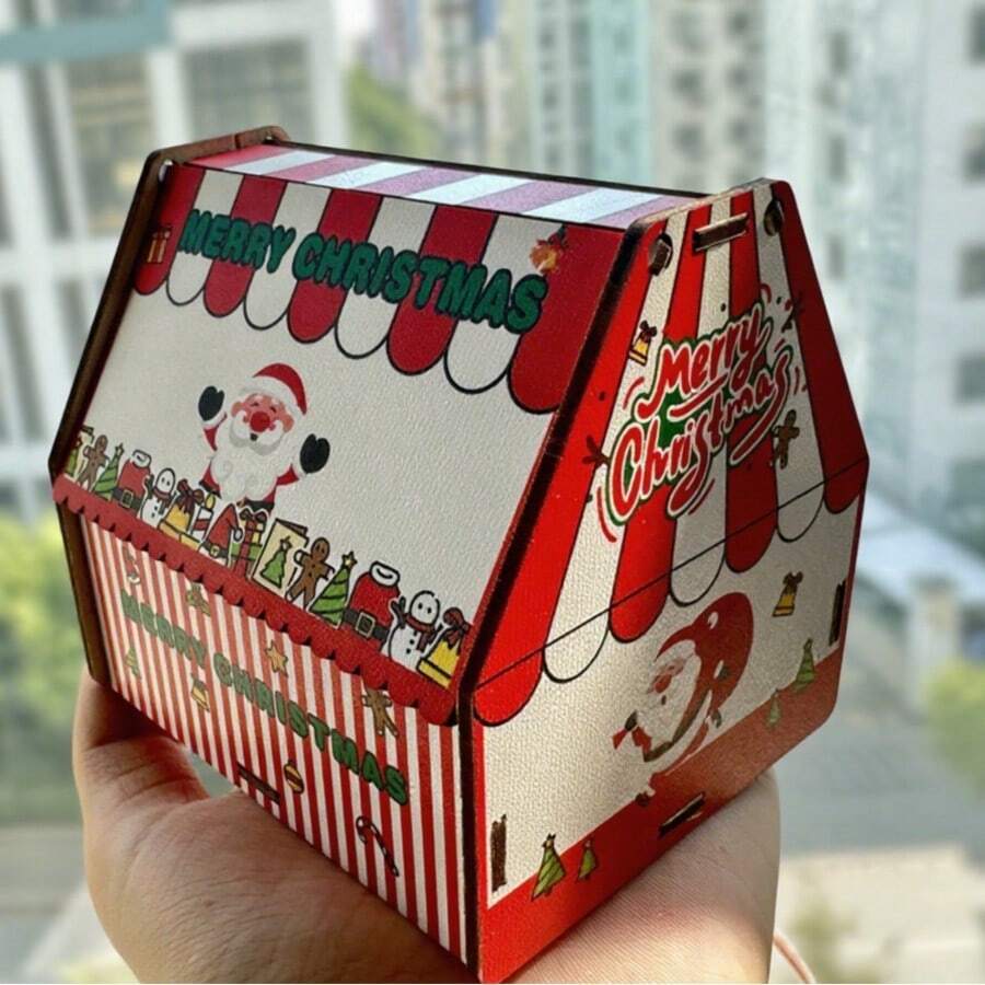 Uma pequena caixa de armazenamento de madeira com um padrão de desenho animado de um Papai Noel colorido entregando presentes, série de montagem DIY não concluída.