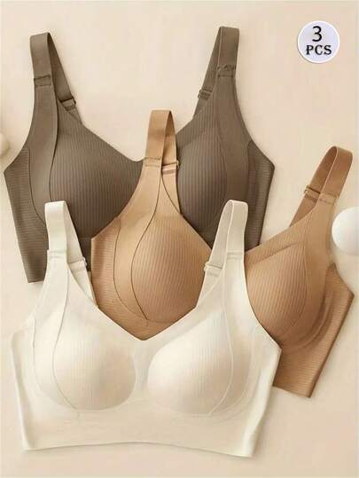 Set de 3 sujetadores deportivos sin costuras, transpirables y inalámbricos para mujeres - Cobertura total, antideslizante, con elevación y soporte, ajuste cómodo con detalles acanalados, mezcla de nailon y elastano, lavar a mano - unicolor elegantes