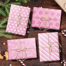 12pcs Each Pack Of 12 Pink Christmas Gift Decorative Paper, Holiday Gift Box Paper, Snowflake Gingerbread Man Decorative Wrapping Paper, With A Christmas Theme, Is Designed With Various Stripes, Polka Dots, Candy Canes And Gingerbread Men. The Main Color Is Pink, Which Is Cute And Exquisite, And Will Greatly Increase The Fun And Festive Atmosphere