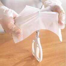 50 Piezas / 100 Piezas Guantes desechables de TPE Guantes desechables Guantes protectores de TPE transparentes y gruesos Guantes de película