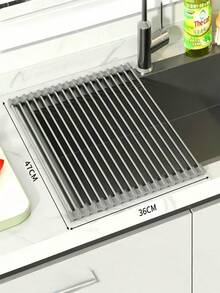 1 قطعة رف تجفيف الأطباق قابل للطي، رف أطباق متعدد الوظائف من الفولاذ المقاوم للصدأ، رف قابل للطي من الفولاذ المقاوم للصدأ، بساط تصريف الحوض، أداة مطبخ، حامل أواني مقاوم للحرارة، بساط أطباق، ملحق مطبخ، مناسب لتصريف وتجفيف أدوات المطبخ والأكواب والأطباق والحفاظ على نظافة المطبخ. ويمكن استخدامه أيضًا كوسادة شواء أو حامل أواني أو قاعدة تحت الأكواب وما إلى ذلك.