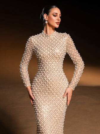 Faeriesty 这款高贵典雅的女士正式礼服，采用小立领、长袖和精致的珠饰鱼尾裙摆设计，尽显优雅气质——是盛大婚礼、高端晚宴、奢华新年派对、著名颁奖典礼和专属慈善舞会等场合的完美之选。