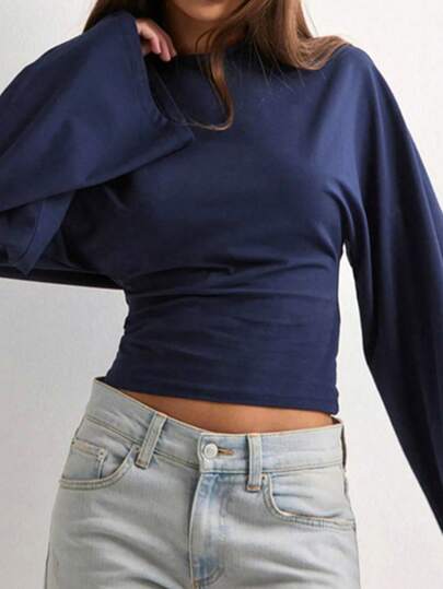 Damen marineblau gestricktes Rundhals-Langarm-T-Shirt mit weitem Ärmel, stilvoll und weich