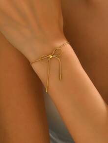 1 件精致金色蝴蝶结手链，细链设计打造柔和的蝴蝶轮廓，紧密贴合手腕，为腕间增添优雅、甜美的魅力 - 金黃色 - 查看 2