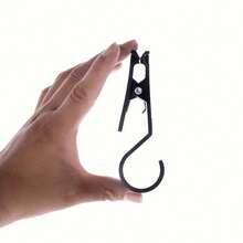 4/8个装便携式户外帐篷夹，多功能挂钩支架，多用途户外帐篷夹钩，便携式防滑，优质PP材质，适用于露营、徒步、探险、旅行，可安全固定衣物、毛巾和装备，无需电池，带香味储存系统，可用于固定衣物、悬挂物品和搭建帐篷，是户外旅行的必备品。 - 黑色 - 查看 4
