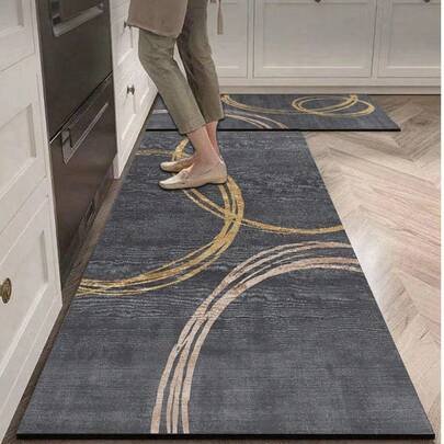 1개 실리카 겔 주방 매트, 비대칭적인 골든 원형 패턴의 다크 그레이 베이스 컬러, 현대적이고 세련된 외관을 위한 오버래핑 디자인, "HAPPY KITCHEN" 캐주얼 분위기, 쿠션과 흡수성 표면을 갖춘 고급스럽고 스타일리시한 주방 카펫