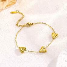 طقم مجوهرات من سلسلة وسوار مع شرابة بشكل قلب من الفولاذ المقاوم للصدأ، تصميم رقيق مناسب للنساء والفتيات للارتداء اليومي والحفلات