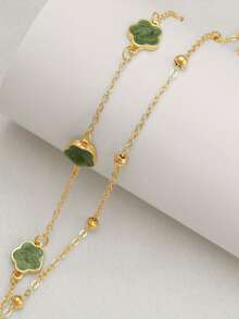 Chiếc vòng tay hình cỏ bốn lá màu xanh thanh lịch này là sự lựa chọn hoàn hảo cho Ngày Valentine, kỷ niệm và cả trang phục hàng ngày. Nó phù hợp để đeo hàng ngày và làm quà tặng trong các dịp lễ. - màu xanh lá - Xem 2