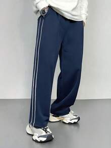 بنطلون رياضي مخطط فضفاض عادي للرجال، خريف